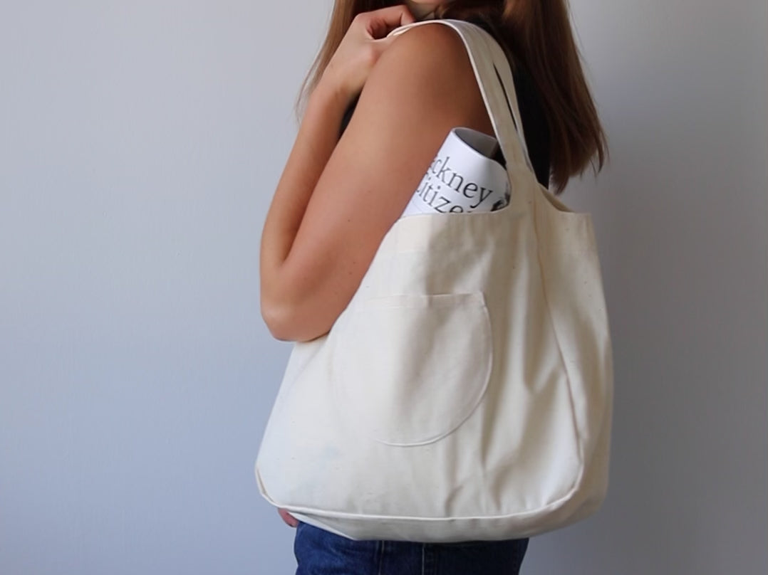Load video: Blue Nude ~ Slow Fashion Brand - Enso Curved Tote Bag in Cream